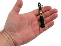 Бронзовая бусина "Коронованный череп" с темляком