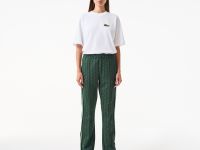 Женские расклешенные спортивные брюки Lacoste с монограммой