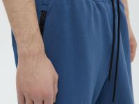 Спортивные брюки зауженного кроя на резинке