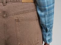 Джинсы flared fit