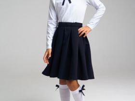 Трикотажная блузка с бантом