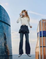 Молочный вязаный кардиган в рубчик с фигурным низом Глория Джинс