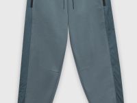 Спортивные брюки свободного силуэта с контрастной отделкой