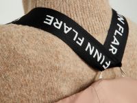 Стеганый пуховик с воротником-стойкой