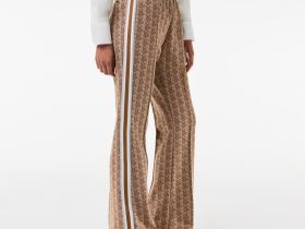 Женские расклешенные спортивные брюки Lacoste с монограммой