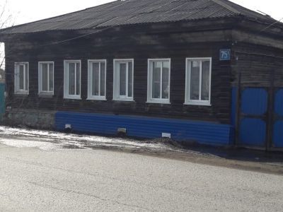 Деревянные жилые дома конца XIX – начала XX века, украшенный обильной пропильной резьбой