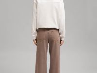 Джинсы расклешенного кроя