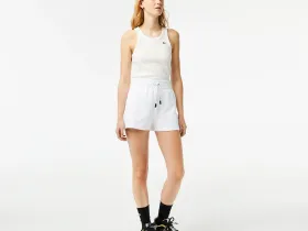 Женские однотонные шорты Lacoste