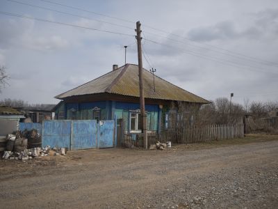 Деревянный жилой дом начала XX века с богатым резным декором