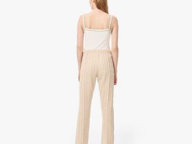 Женские расклешенные спортивные брюки Lacoste с монограммой