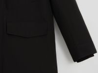 Пуховое полупальто с накладными карманами и капюшо