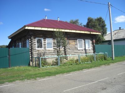 Деревянный жилой дом конца XIX века с богатой глухой резьбой