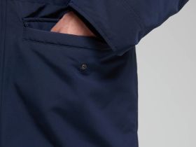 Пуховое полупальто с накладными карманами и капюшоном