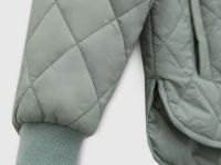 Утепленная стеганая женская куртка