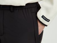 Утепленные брюки широкого кроя с утяжниками по низу