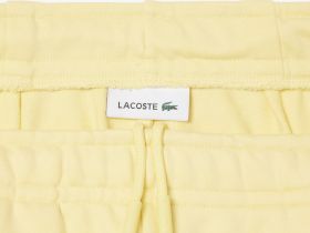 Женские плиссированные флисовые шорты Lacoste