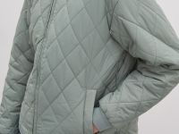 Утепленная стеганая женская куртка