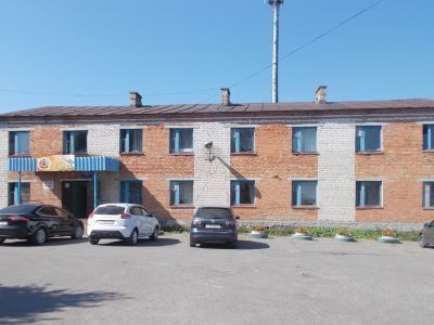 Двухэтажный дом (первый этаж - каменный, второй - деревянный)