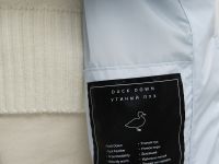 Стеганый пуховик с поясом и капюшоном