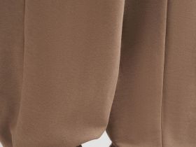 Брюки-джоггеры объемного кроя из футера