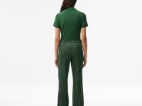 Женские расклешенные спортивные брюки Lacoste с монограммой