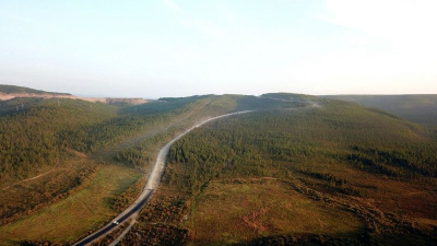 Федеральные дорожники завершают работы по обеспыливанию трассы «Лена» / ЯСИА   