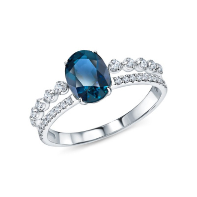 Золотое кольцо с бриллиантами природными и топазами природными