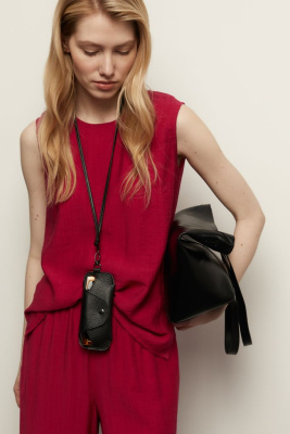 Блузка без рукавов свободного кроя