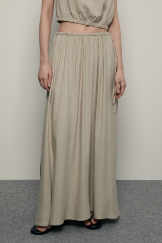 Юбка А-силуэта с поясом на резинке и боковыми разрезами