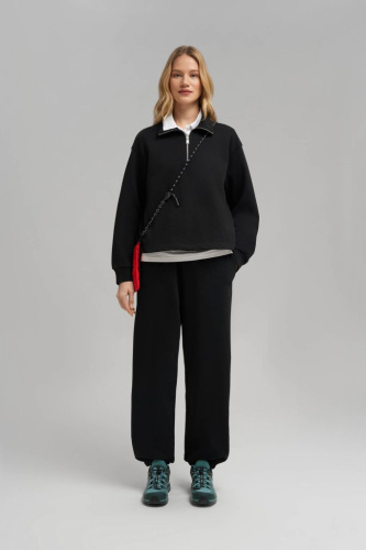 Брюки-джоггеры объемного кроя из футера