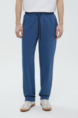 Спортивные брюки зауженного кроя на резинке