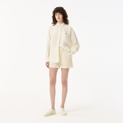 Женские короткие однотонные шорты Lacoste