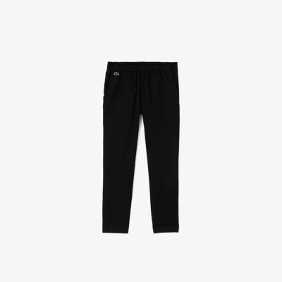 Детские эластичные хлопковые штаны Lacoste