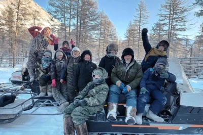 Внуки оленеводов в Момском районе устроили гонки на санках за живого оленя / Мария Горохова   