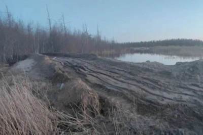 В Намском районе ликвидировали прорыв дамбы на полигоне жидких отходов / ЯСИА   